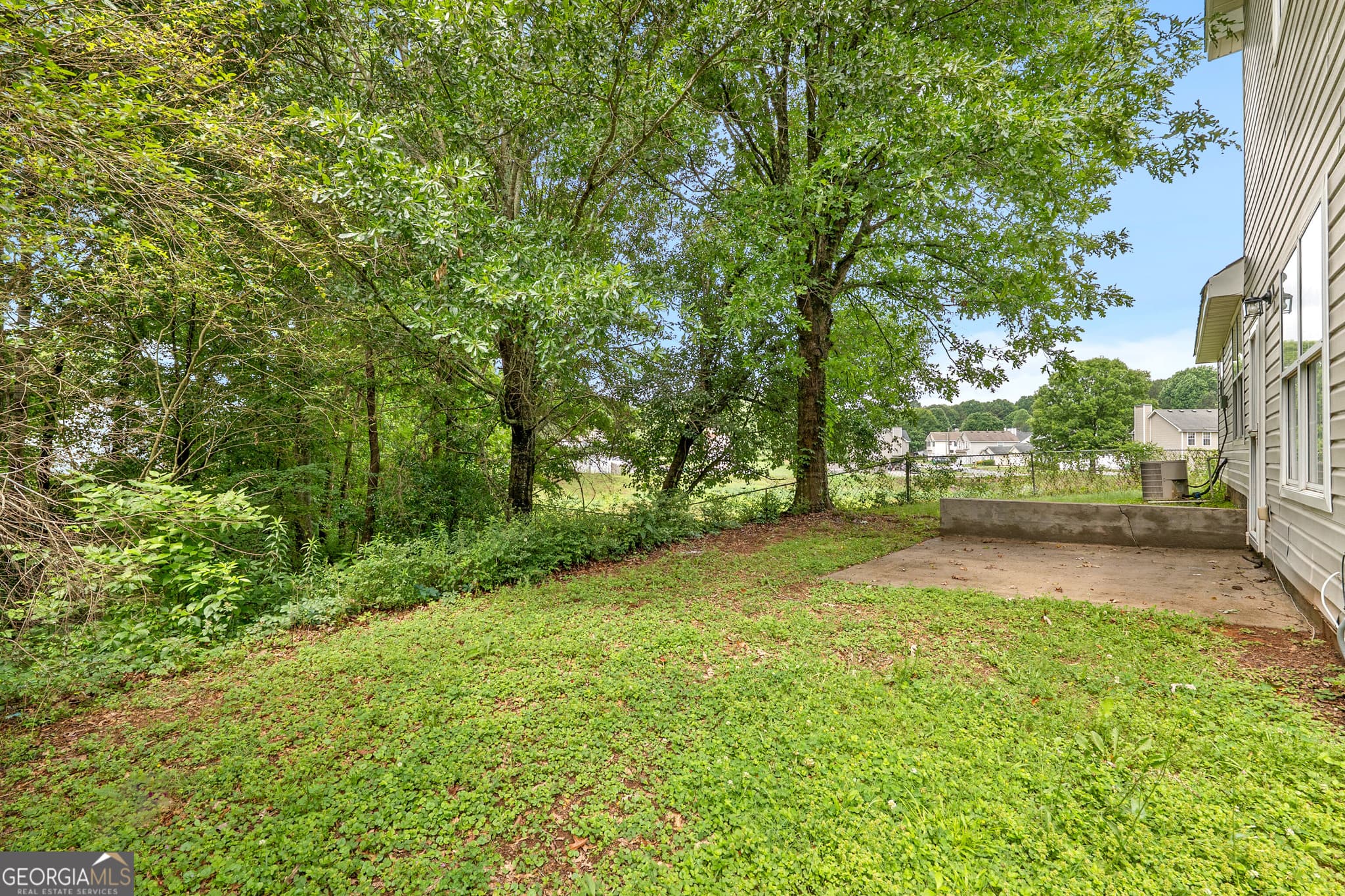 6 bedroom, 2.5 bathroom, 1,684 sq ft single family residence for sale at 3129 Stonebridge Creek Drive, Lithonia, GA 30058 — photo 4