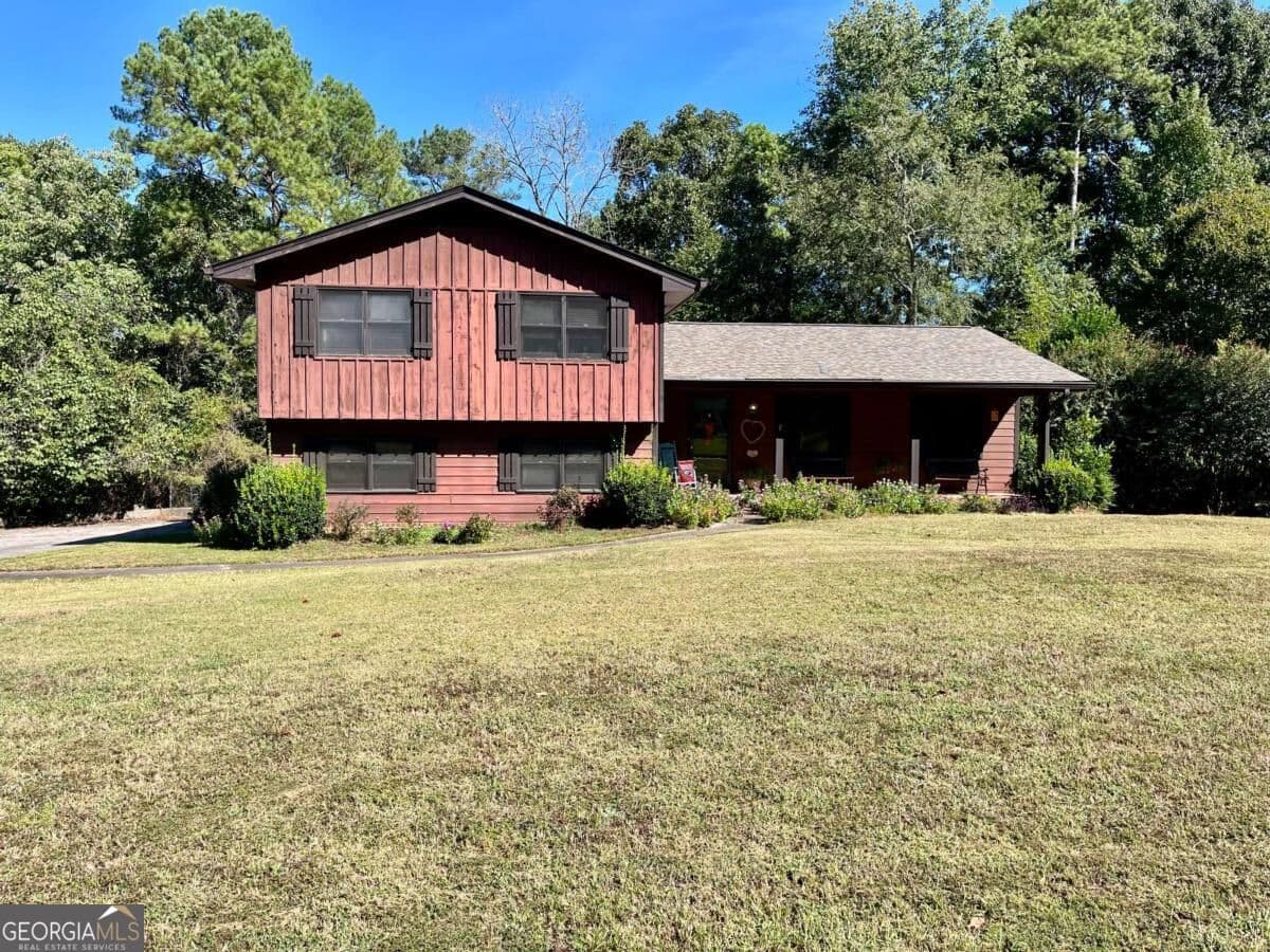 4 bedroom, 2.5 bathroom, 3,874 sq ft single family residence for sale at 3950 Thornridge Way, Atlanta, GA 30340 — photo 2
