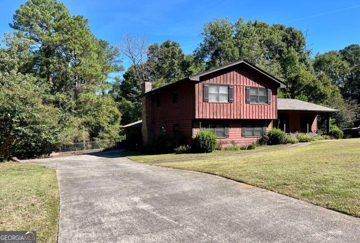 4 bedroom, 2.5 bathroom, 3,874 sq ft single family residence for sale at 3950 Thornridge Way, Atlanta, GA 30340 — photo 1 of 2