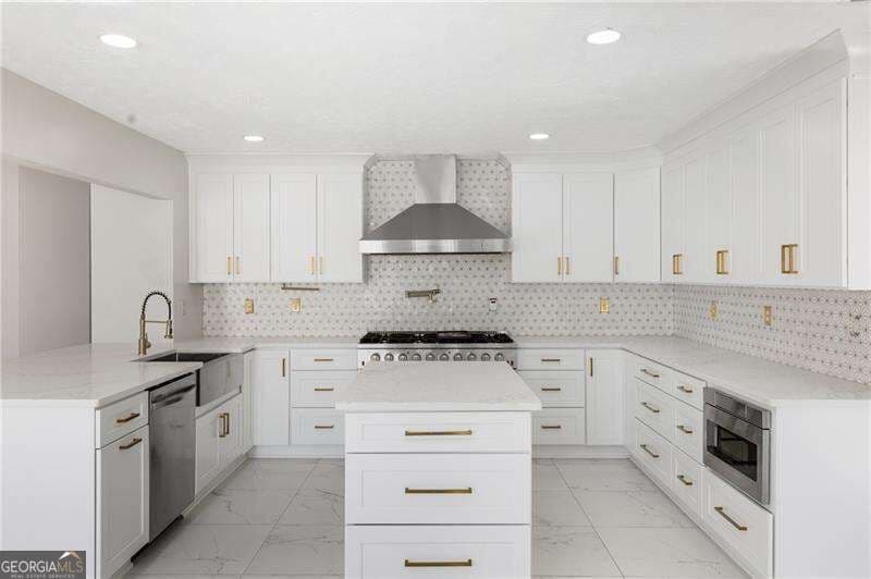 5 bedroom, 2.5 bathroom, 2,972 sq ft single family residence for sale at 3521 Kittery Drive, Snellville, GA 30039 — photo 10