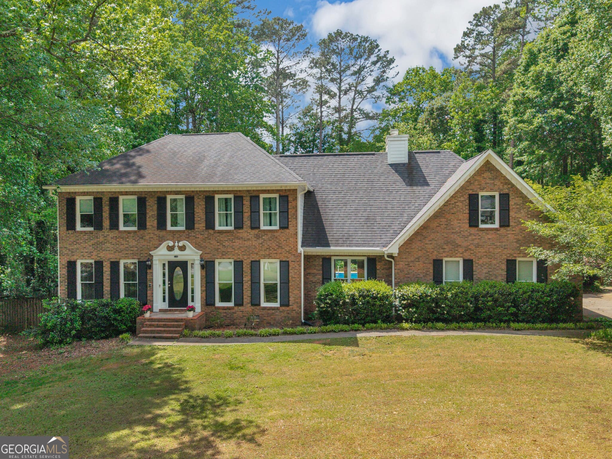 4 bedroom, 3 bathroom, 4,000 sq ft single family residence for sale at 8601 N Shore Drive, Jonesboro, GA 30236 — photo 2