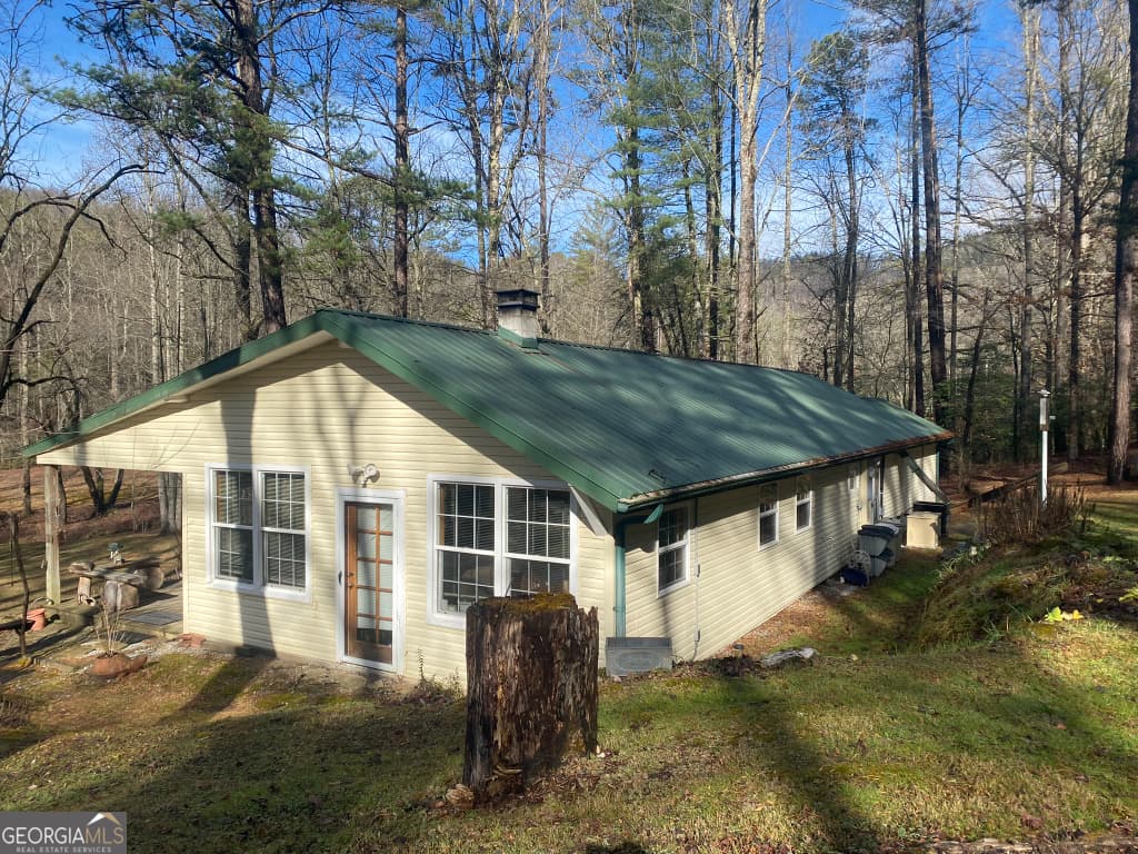 2 bedroom, 2 bathroom, 1,400 sq ft single family residence for sale at 2594 Blue Ridge Gap Road, Clayton, GA 30525 — photo 1 of 77