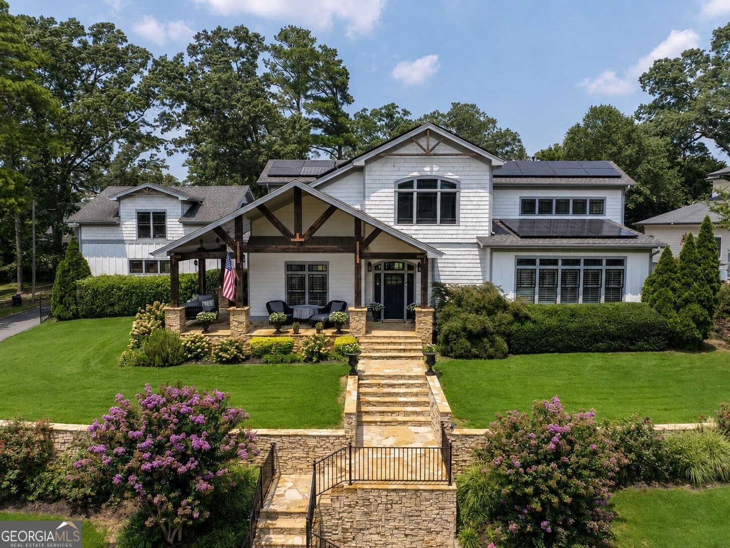 7 bedroom, 6.5 bathroom, 6,024 sq ft single family residence for sale at 2019 Cambridge Avenue, College Park, GA 30337 — photo 1 of 58