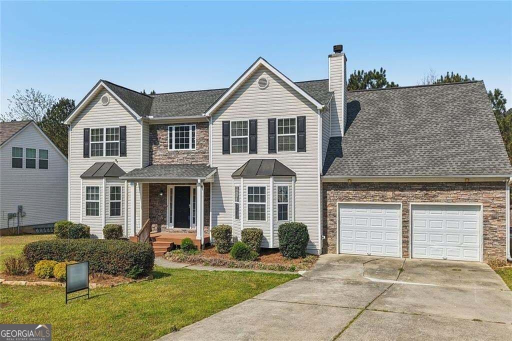 4 bedroom, 3.5 bathroom, 4,432 sq ft single family residence for sale at 5472 Skylar Creek Lane, Buford, GA 30518 — photo 2