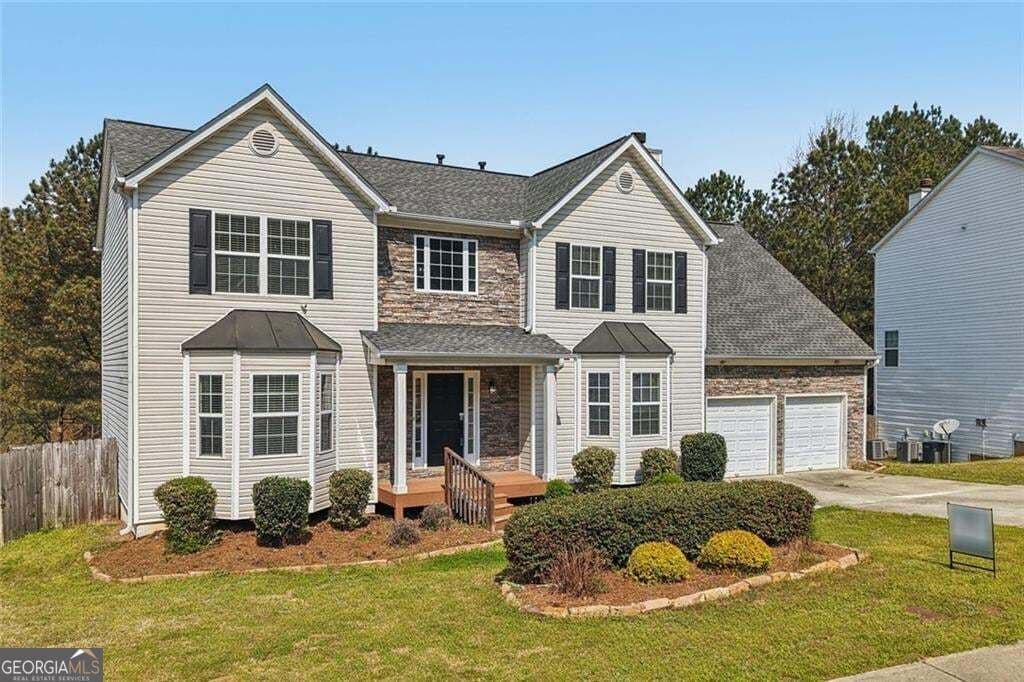 4 bedroom, 3.5 bathroom, 4,432 sq ft single family residence for sale at 5472 Skylar Creek Lane, Buford, GA 30518 — photo 3