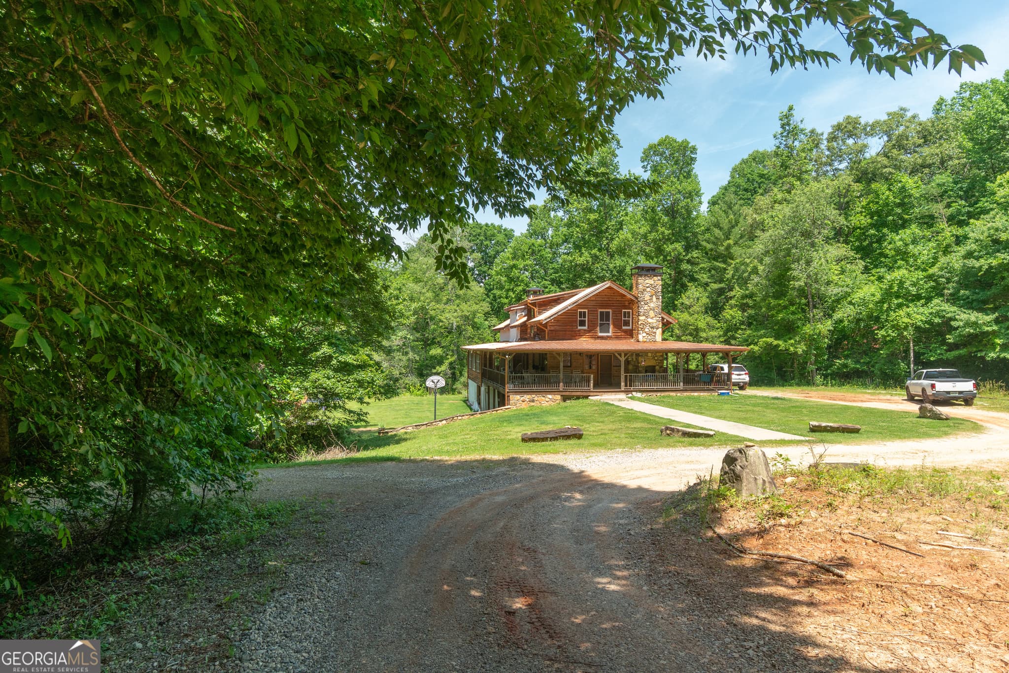 5 bedroom, 3 bathroom, 6,472 sq ft single family residence for sale at 440 Joe Franklin Road, Sautee Nacoochee, GA 30571 — photo 6