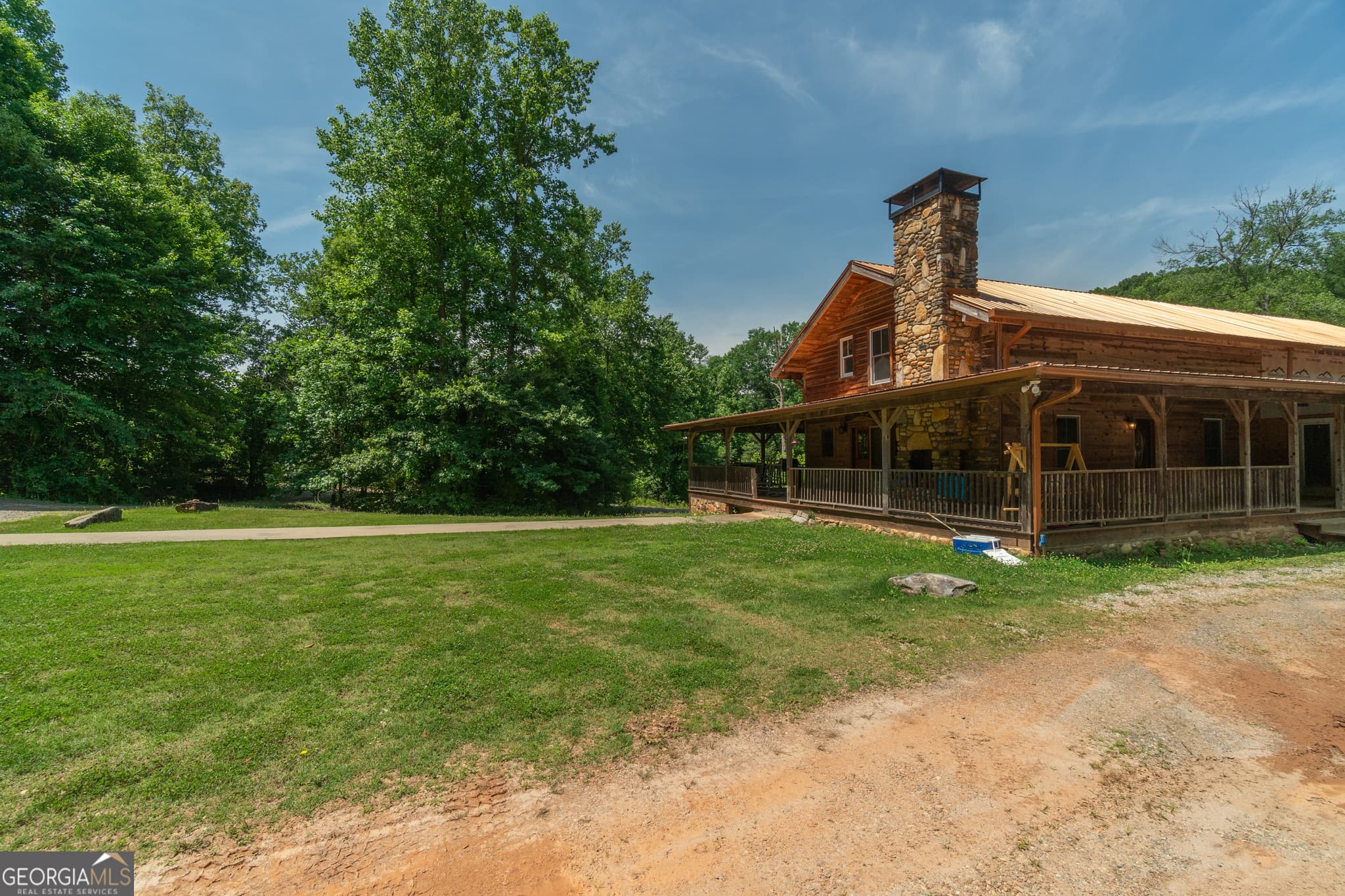 5 bedroom, 3 bathroom, 6,472 sq ft single family residence for sale at 440 Joe Franklin Road, Sautee Nacoochee, GA 30571 — photo 3