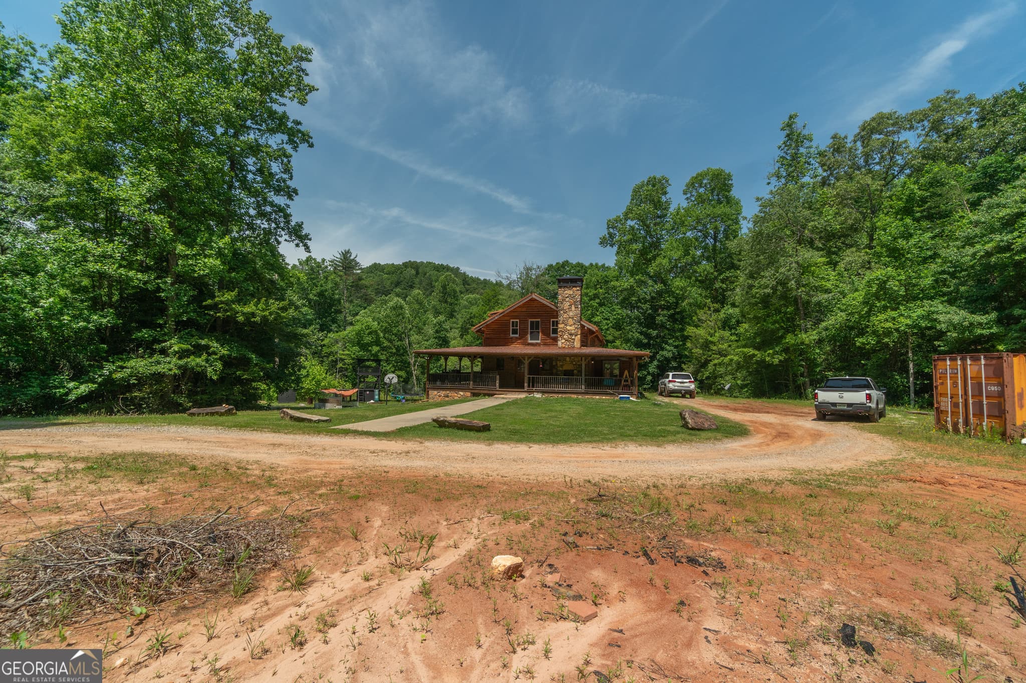 5 bedroom, 3 bathroom, 6,472 sq ft single family residence for sale at 440 Joe Franklin Road, Sautee Nacoochee, GA 30571 — photo 5