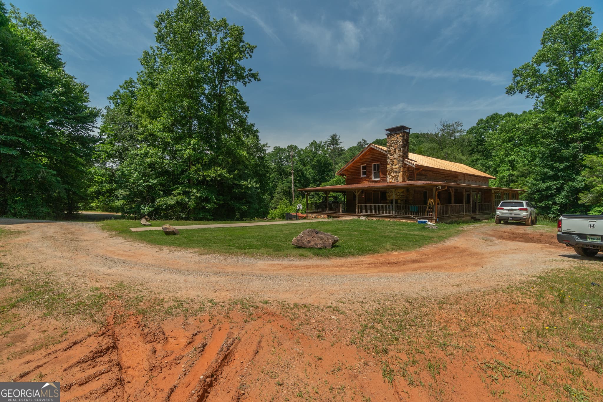 5 bedroom, 3 bathroom, 6,472 sq ft single family residence for sale at 440 Joe Franklin Road, Sautee Nacoochee, GA 30571 — photo 4