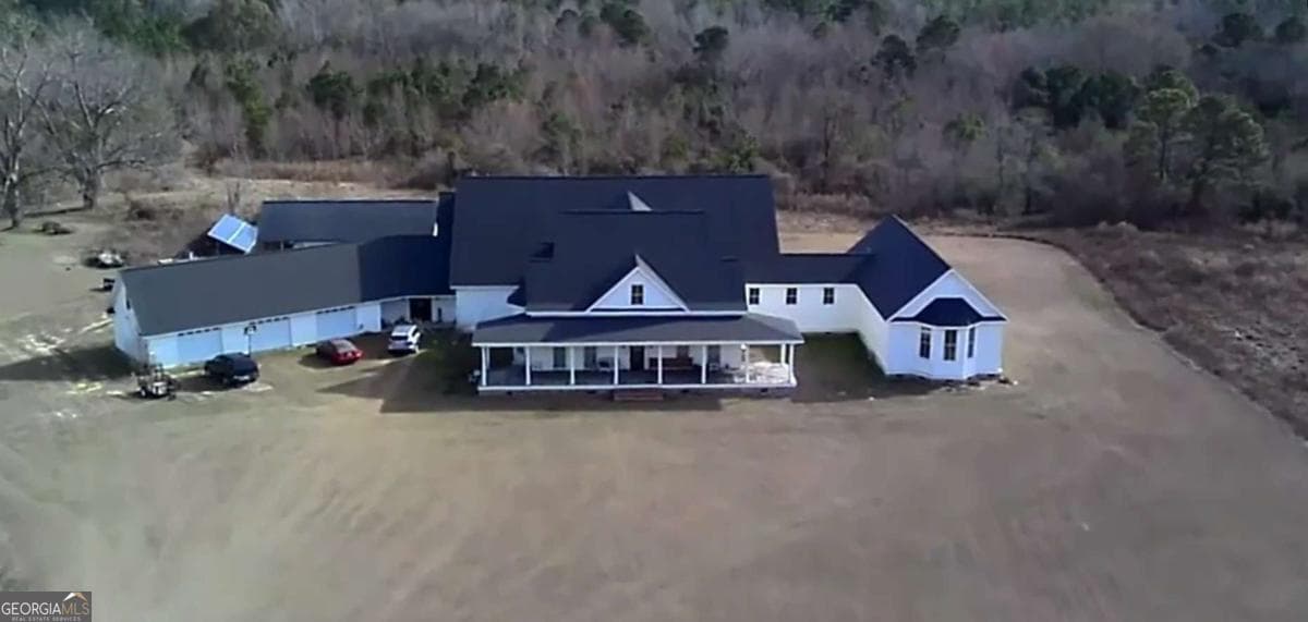 7 bedroom, 6 bathroom, 8,427 sq ft farm for sale at 40 Drew Bennett Road, Midville, GA 30441 — photo 2