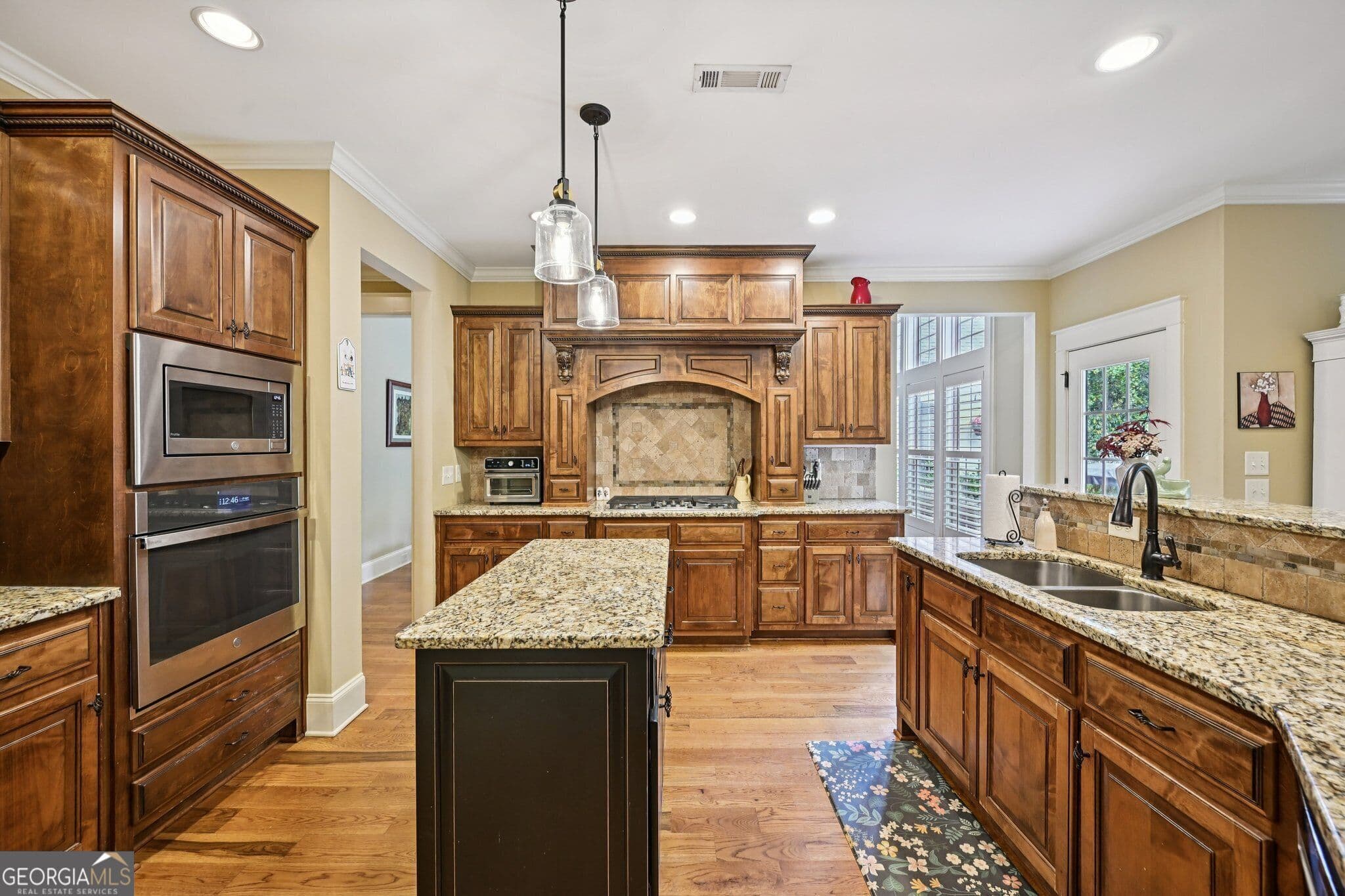 6 bedroom, 4.5 bathroom, 6,300 sq ft single family residence for sale at 395 Beaumont Farms Drive, Sharpsburg, GA 30277 — photo 10
