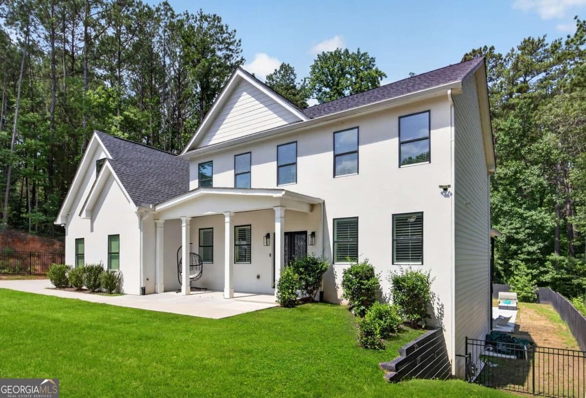 5 bedroom, 6 bathroom, 6,100 sq ft single family residence for sale at 4492 Muhammad Drive, Atlanta, GA 30349 — photo 2