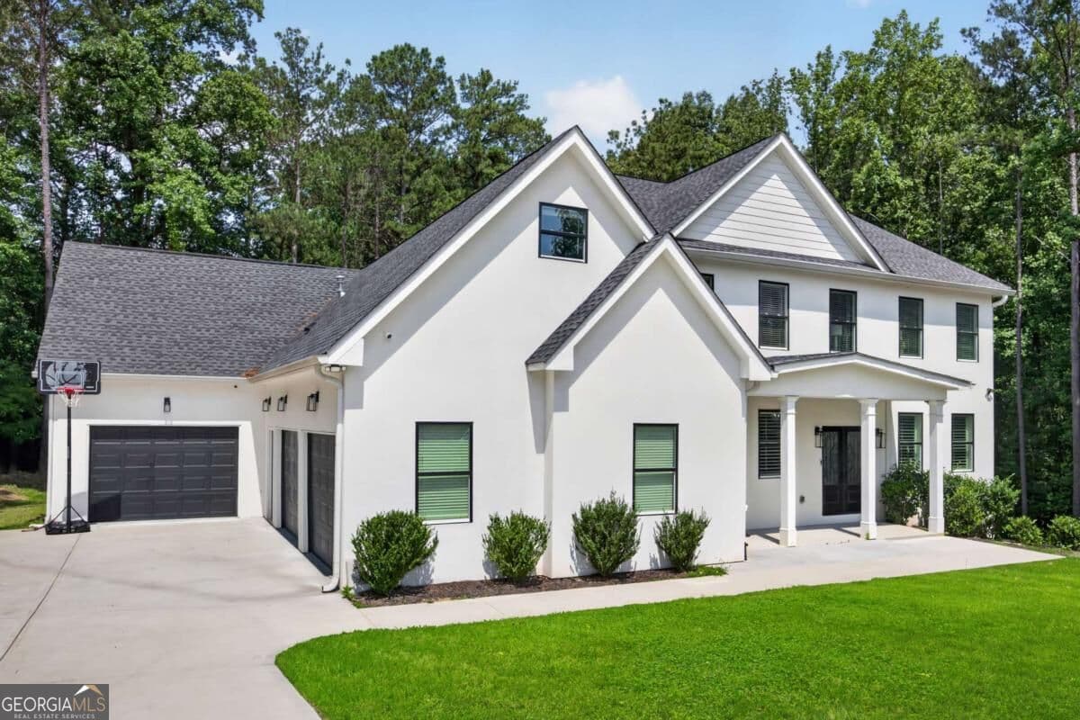 5 bedroom, 6 bathroom, 6,100 sq ft single family residence for sale at 4492 Muhammad Drive, Atlanta, GA 30349 — photo 3