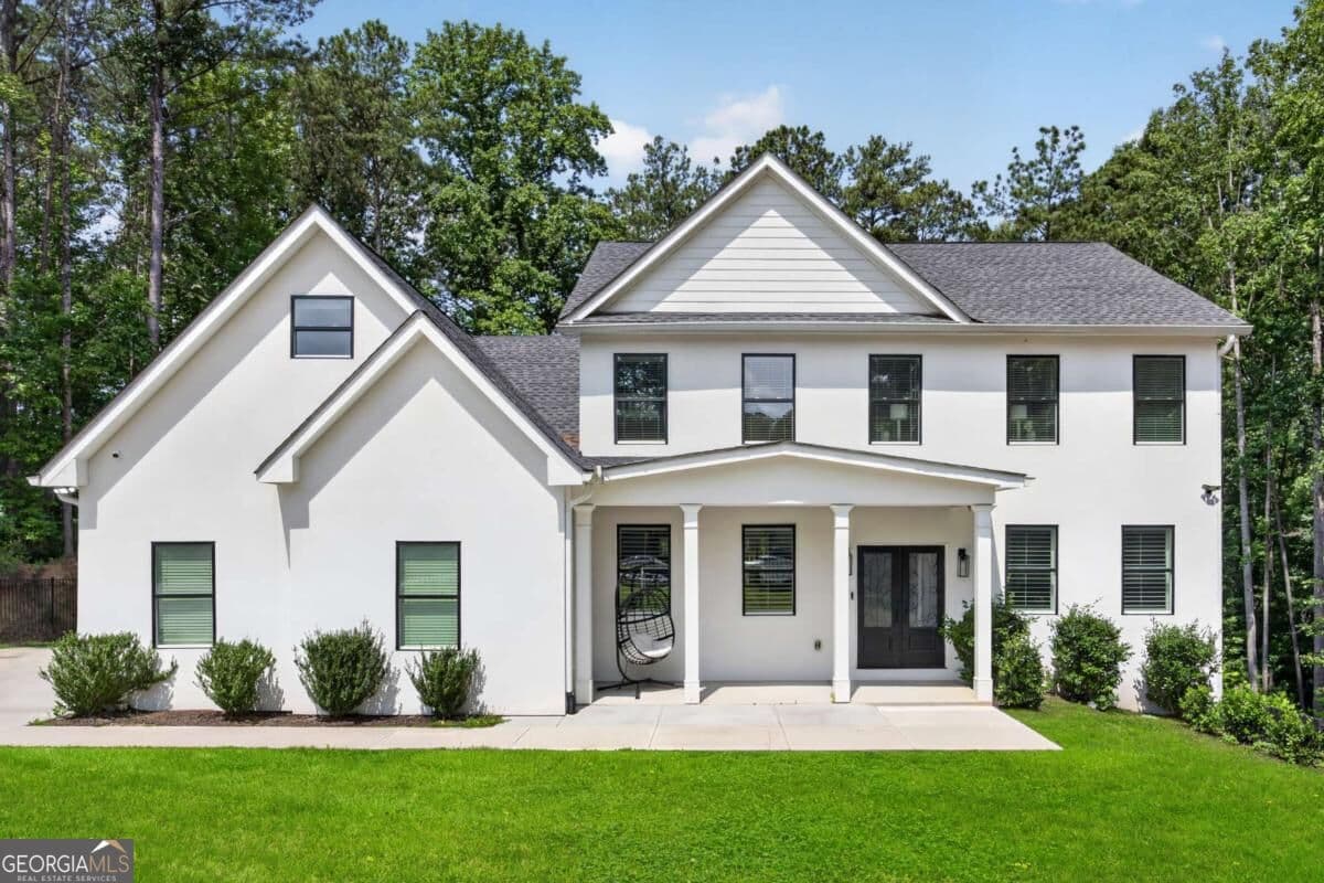 5 bedroom, 6 bathroom, 6,100 sq ft single family residence for sale at 4492 Muhammad Drive, Atlanta, GA 30349 — photo 1 of 49