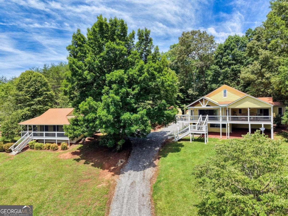 4 bedroom, 3.5 bathroom, 3,106 sq ft cabin,single family residence for sale at 602+557 Hidden Pines Court 1 + 10, Hiawassee, GA 30546 — photo 1 of 51