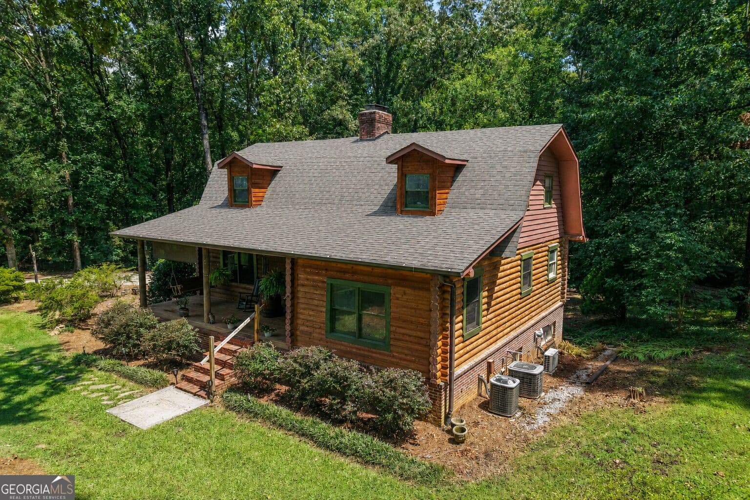 4 bedroom, 3.5 bathroom, 2,402 sq ft cabin,single family residence for sale at 479 Jim Starr Road, Newnan, GA 30263 — photo 2