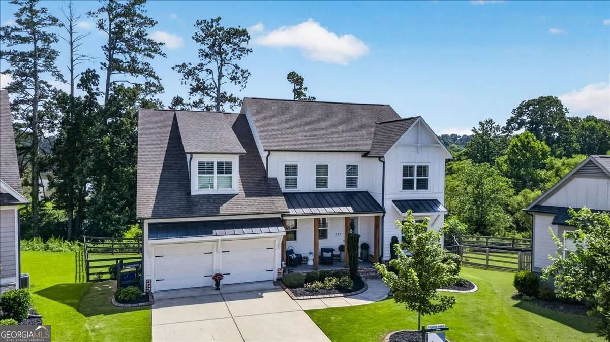 6 bedroom, 4.5 bathroom, 4,768 sq ft single family residence for sale at 757 Bridgeview Drive, Canton, GA 30115 — photo 5