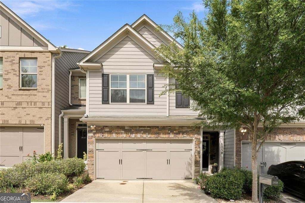 3 bedroom, 2.5 bathroom, 2,000 sq ft townhouse for sale at 5058 Whiteoak Street, Smyrna, GA 30080 — photo 1 of 23