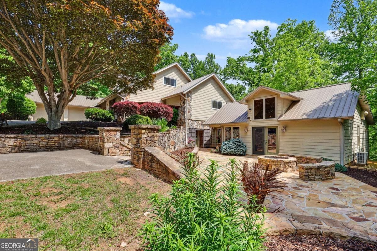 4 bedroom, 4 bathroom, 6,209 sq ft single family residence for sale at 792 Bugscuffle Road, Hiawassee, GA 30546 — photo 6