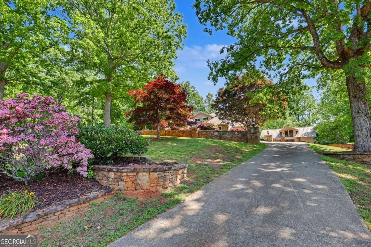 4 bedroom, 4 bathroom, 6,209 sq ft single family residence for sale at 792 Bugscuffle Road, Hiawassee, GA 30546 — photo 7