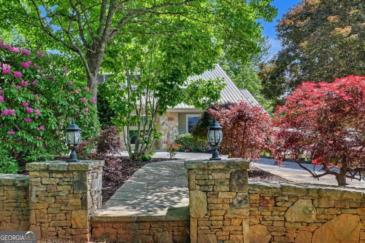 4 bedroom, 4 bathroom, 6,209 sq ft single family residence for sale at 792 Bugscuffle Road, Hiawassee, GA 30546 — photo 3