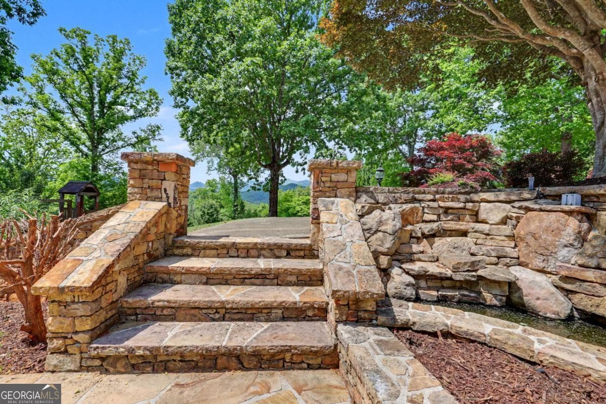 4 bedroom, 4 bathroom, 6,209 sq ft single family residence for sale at 792 Bugscuffle Road, Hiawassee, GA 30546 — photo 4