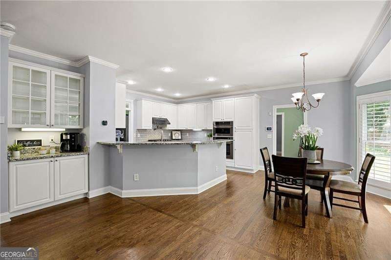 6 bedroom, 4.5 bathroom, 3,993 sq ft single family residence for sale at 3071 Winborn Ridge, Kennesaw, GA 30152 — photo 2