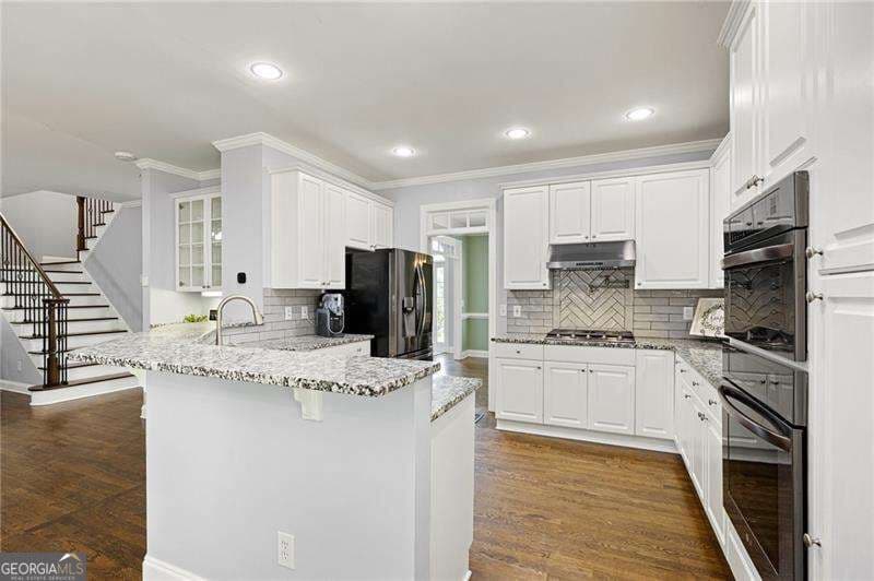 6 bedroom, 4.5 bathroom, 3,993 sq ft single family residence for sale at 3071 Winborn Ridge, Kennesaw, GA 30152 — photo 3