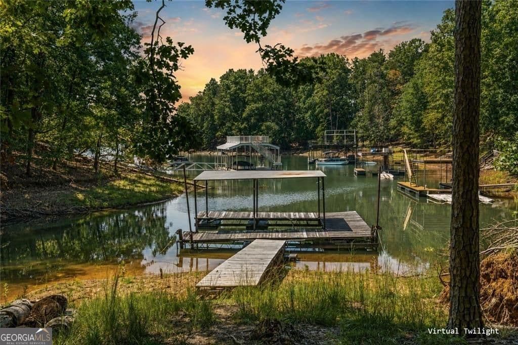 7 bedroom, 6 bathroom, 6,515 sq ft single family residence for sale at 7488 Shadburn Ferry Road, Cumming, GA 30041 — photo 7
