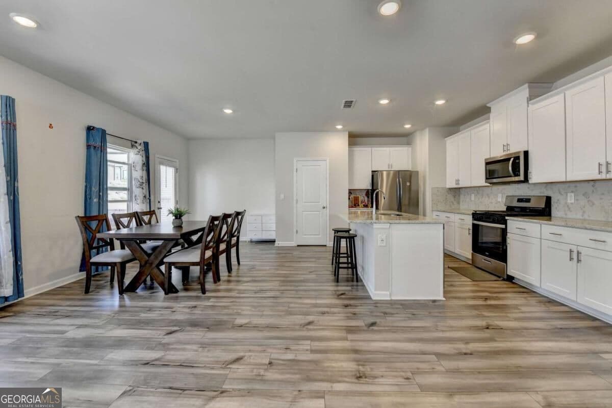 4 bedroom, 2.5 bathroom, 1,963 sq ft single family residence for sale at 2531 Canning View Avenue, Lawrenceville, GA 30044 — photo 6