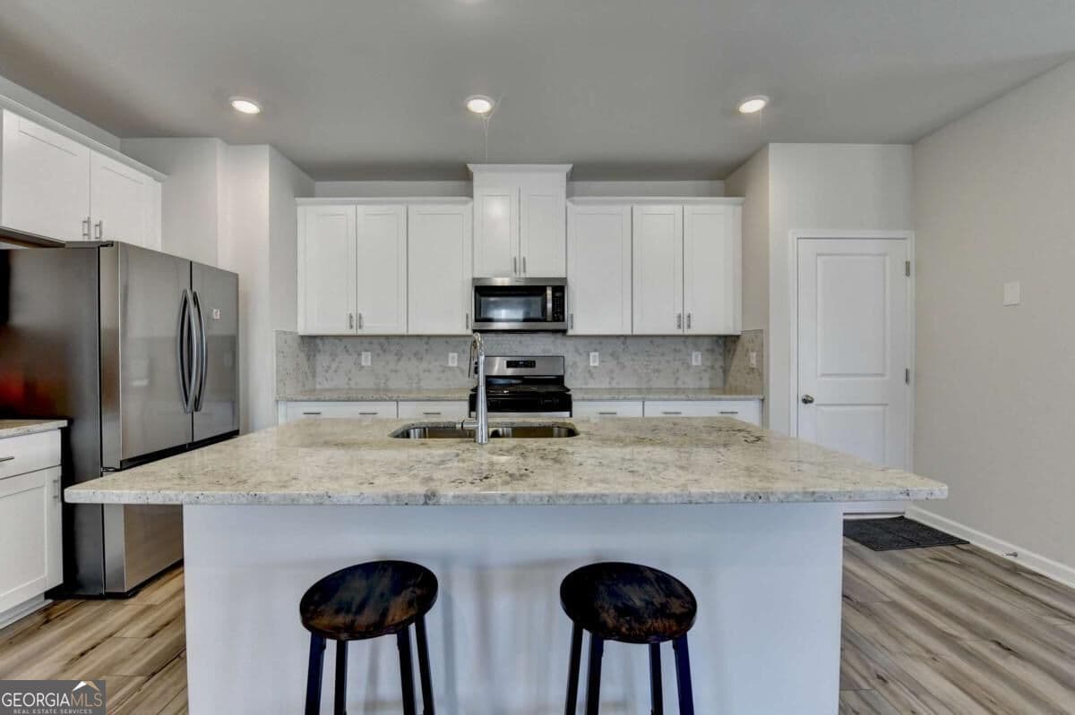 4 bedroom, 2.5 bathroom, 1,963 sq ft single family residence for sale at 2531 Canning View Avenue, Lawrenceville, GA 30044 — photo 10