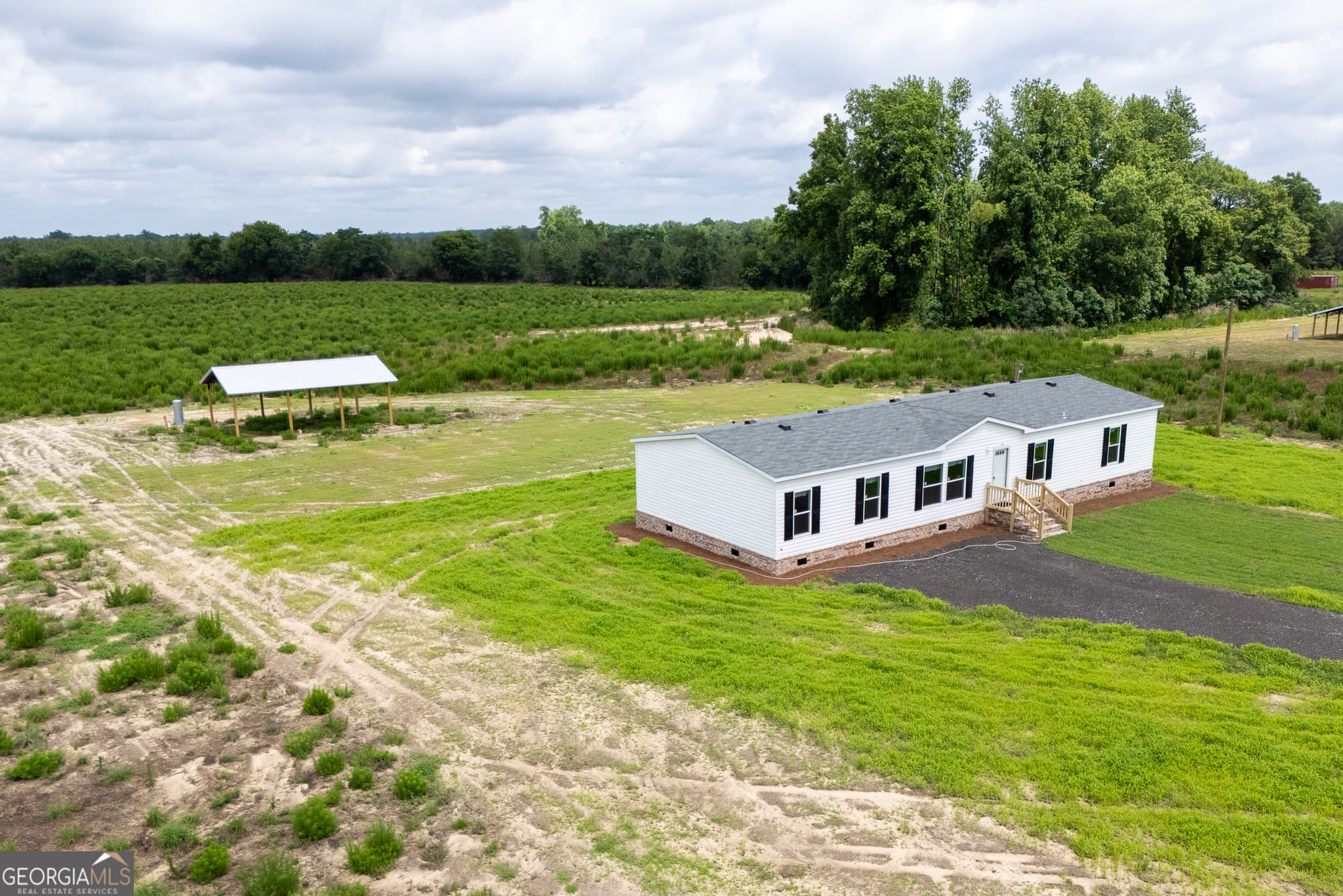 4 bedroom, 2 bathroom, 1,768 sq ft manufactured home,single family residence under contract at 444 LB Hall Road, Garfield, GA 30425 — photo 4