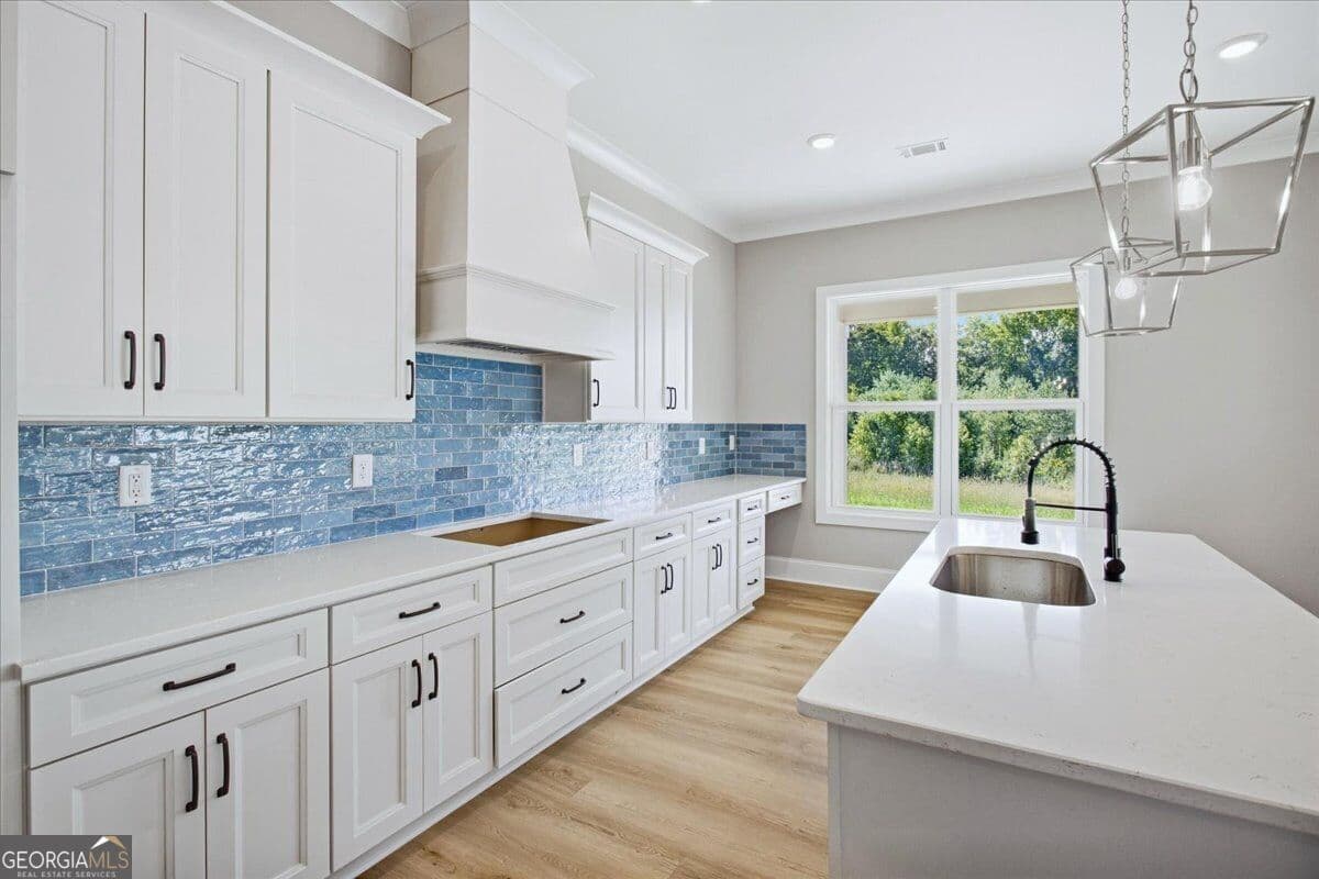 5 bedroom, 4 bathroom, 3,843 sq ft single family residence for sale at 137 Twin Oaks Drive, Hampton, GA 30228 — photo 9