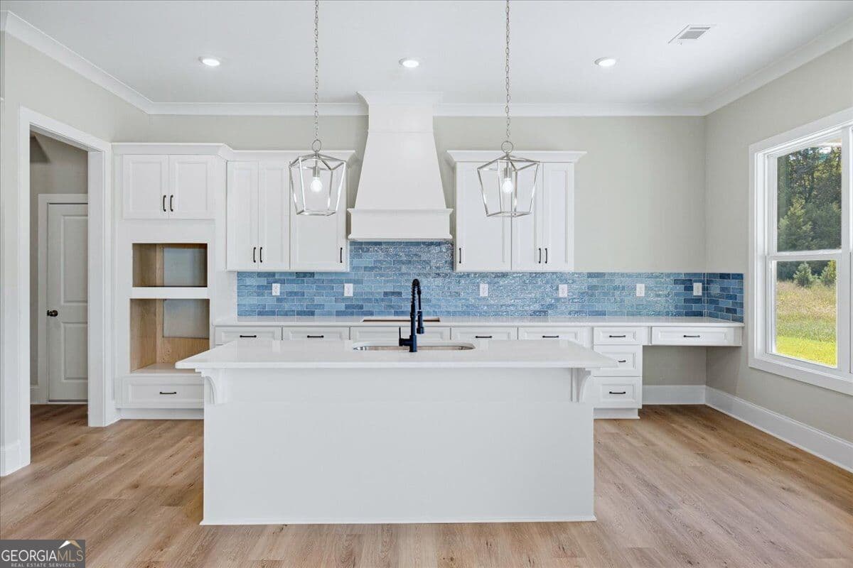 5 bedroom, 4 bathroom, 3,843 sq ft single family residence for sale at 137 Twin Oaks Drive, Hampton, GA 30228 — photo 8