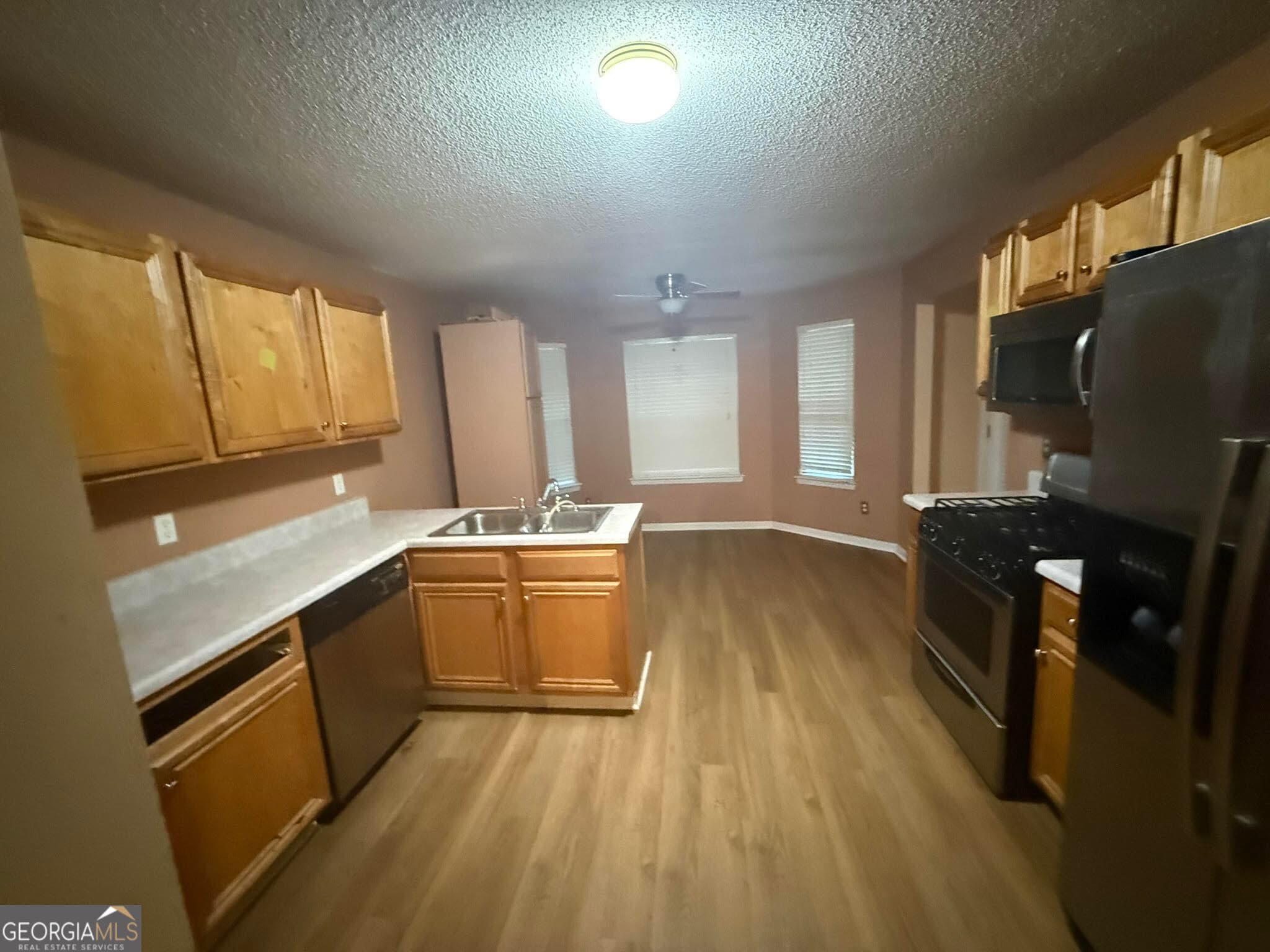 4 bedroom, 3.5 bathroom, 1,706 sq ft single family residence for sale at 6869 Fireside Lane, Atlanta, GA 30349 — photo 8