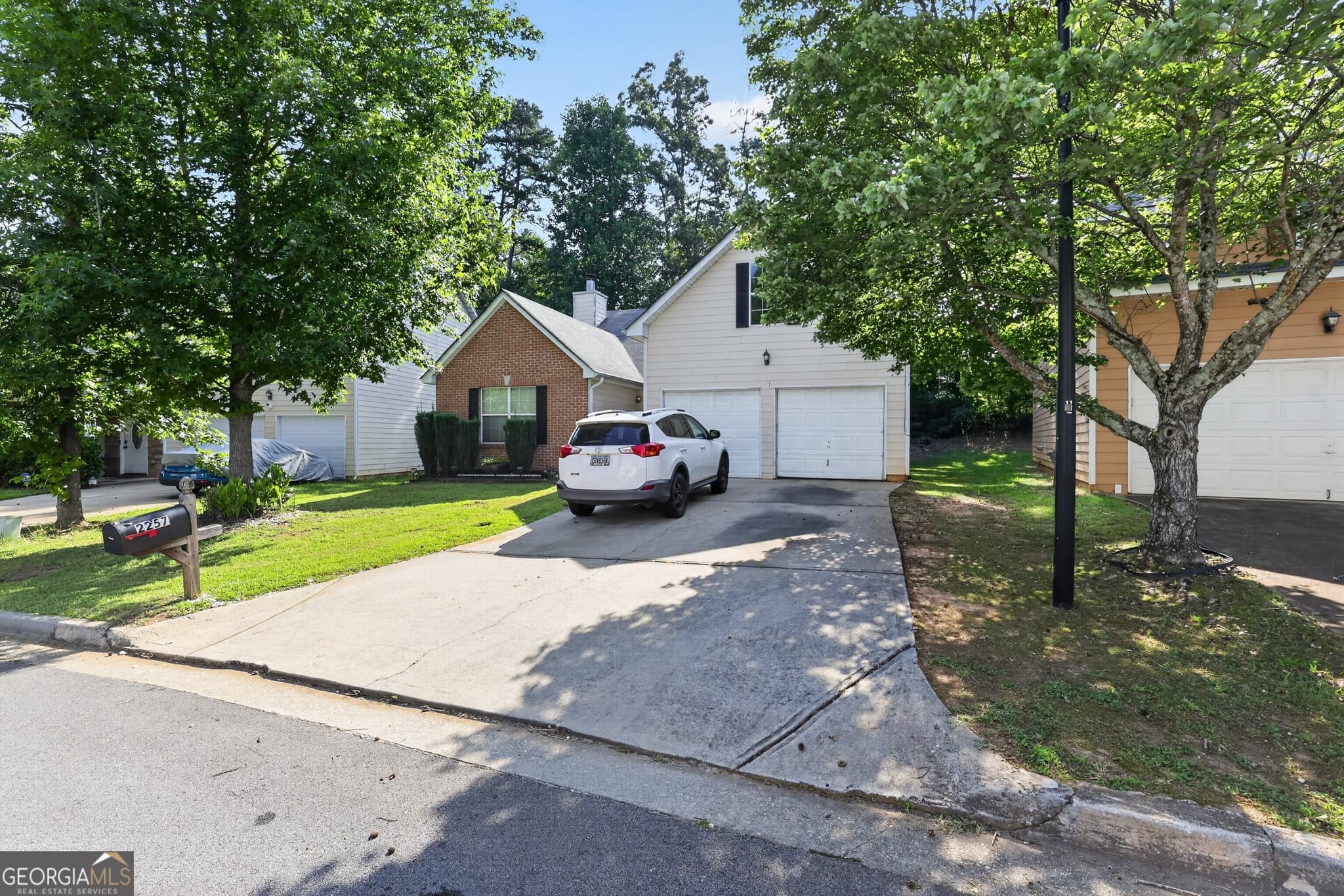 4 bedroom, 3 bathroom, 1,884 sq ft single family residence for sale at 2257 Creel Road, South Fulton, GA 30349 — photo 2