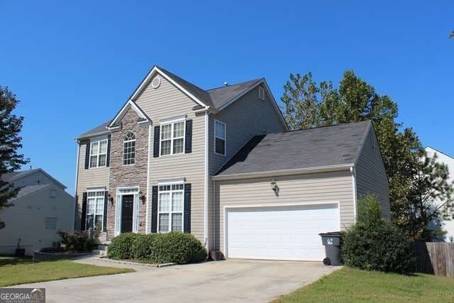 3 bedroom, 2.5 bathroom, 1,992 sq ft single family residence for sale at 960 Millrace Way, Sugar Hill, GA 30518 — photo 2
