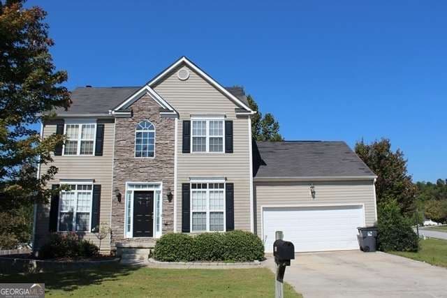 3 bedroom, 2.5 bathroom, 1,992 sq ft single family residence for sale at 960 Millrace Way, Sugar Hill, GA 30518 — photo 1 of 30