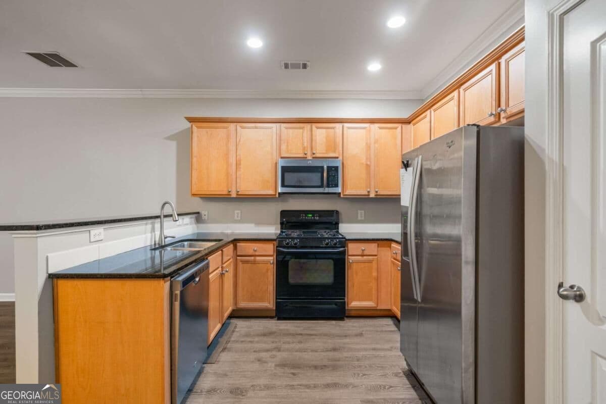3 bedroom, 3.5 bathroom townhouse for rent at 1030 Firethorne Pass, Cumming, GA 30040 for $2,400 a month — photo 2