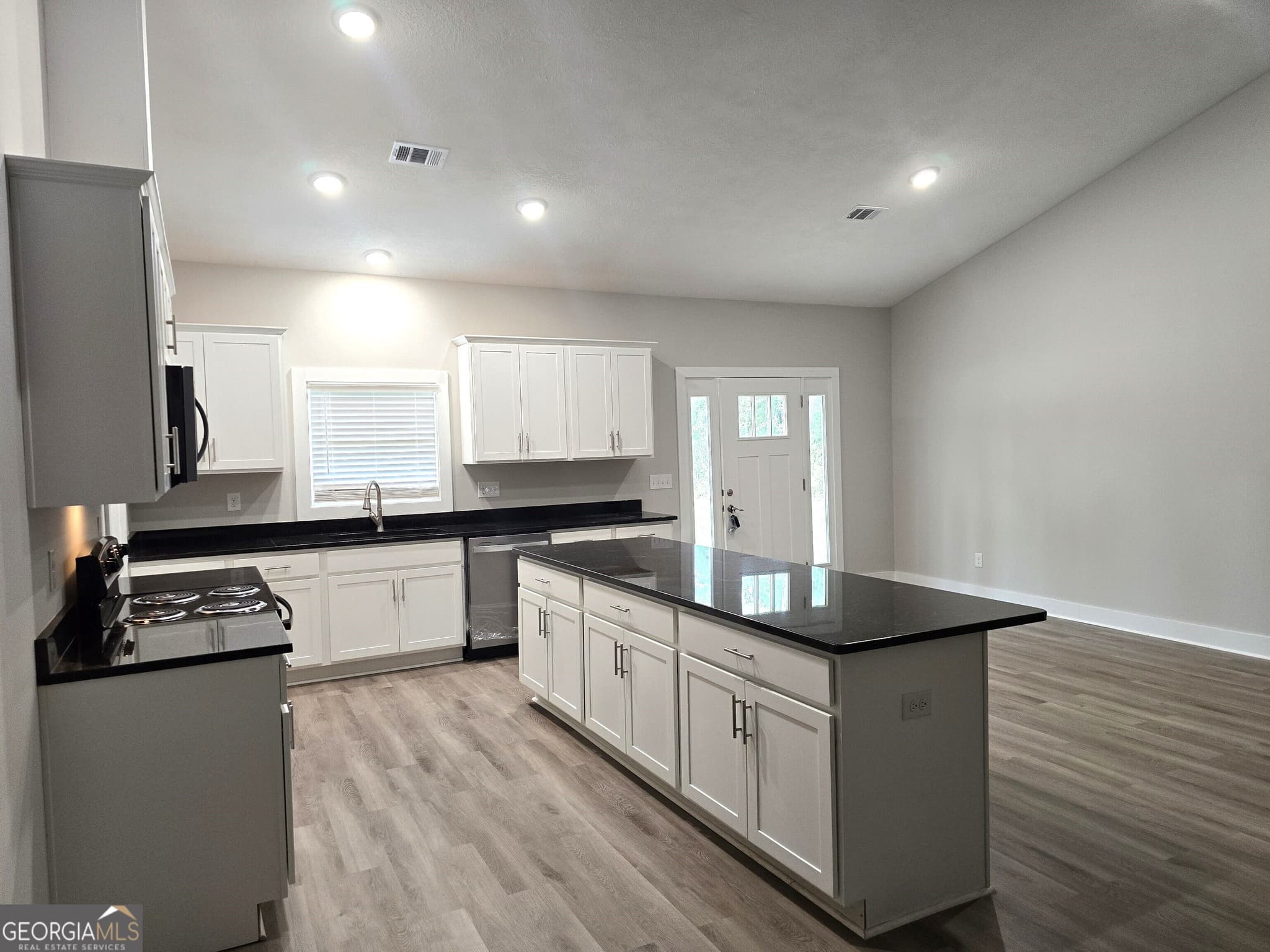4 bedroom, 3 bathroom, 2,435 sq ft single family residence for sale at 169 E Sheppard Street, Stapleton, GA 30823 — photo 3