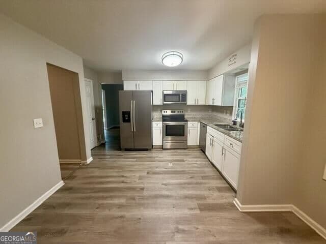 4 bedroom, 2.5 bathroom, 2,830 sq ft single family residence for sale at 1925 Geyser Trace, Lawrenceville, GA 30044 — photo 8