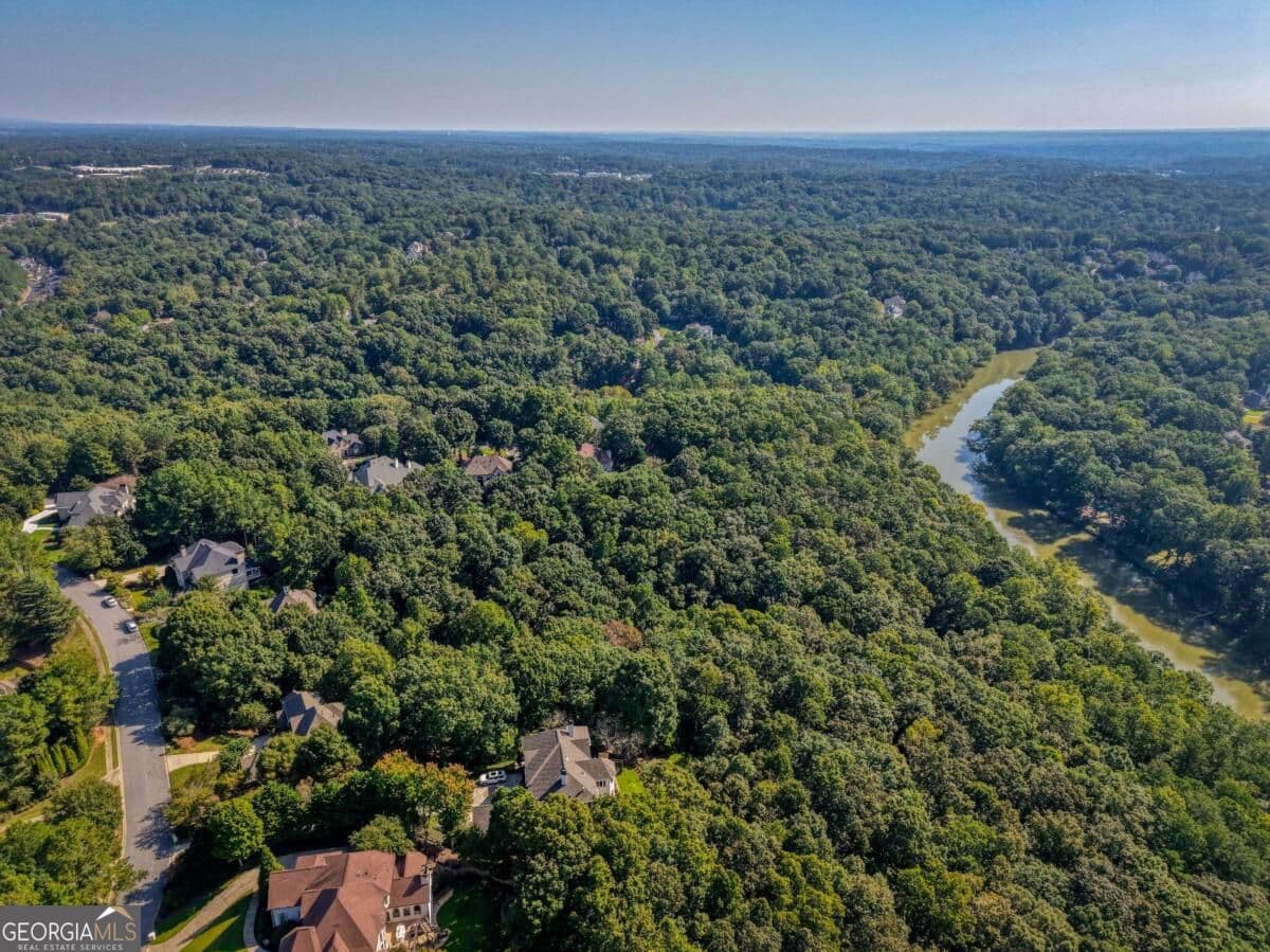5 bedroom, 5.5 bathroom, 8,055 sq ft single family residence for sale at 8370 Sentinae Chase Drive, Roswell, GA 30076 — photo 3