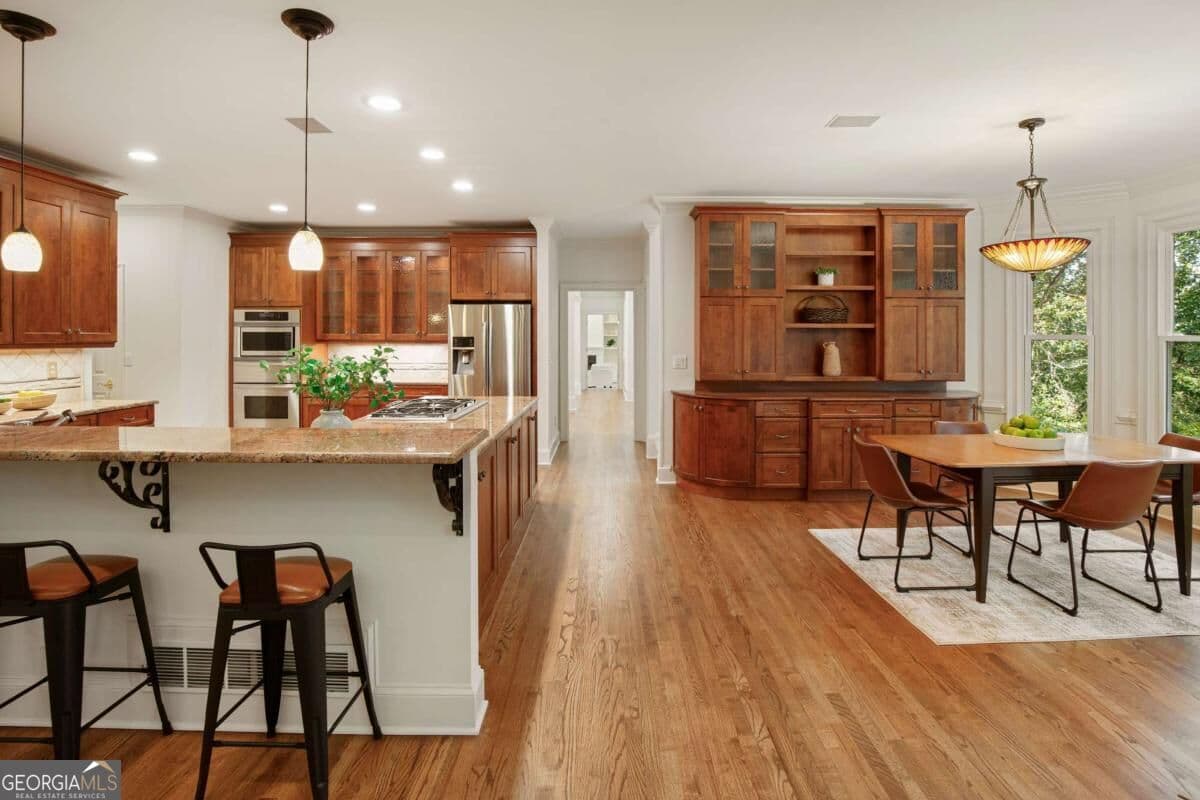 5 bedroom, 5.5 bathroom, 8,055 sq ft single family residence for sale at 8370 Sentinae Chase Drive, Roswell, GA 30076 — photo 8