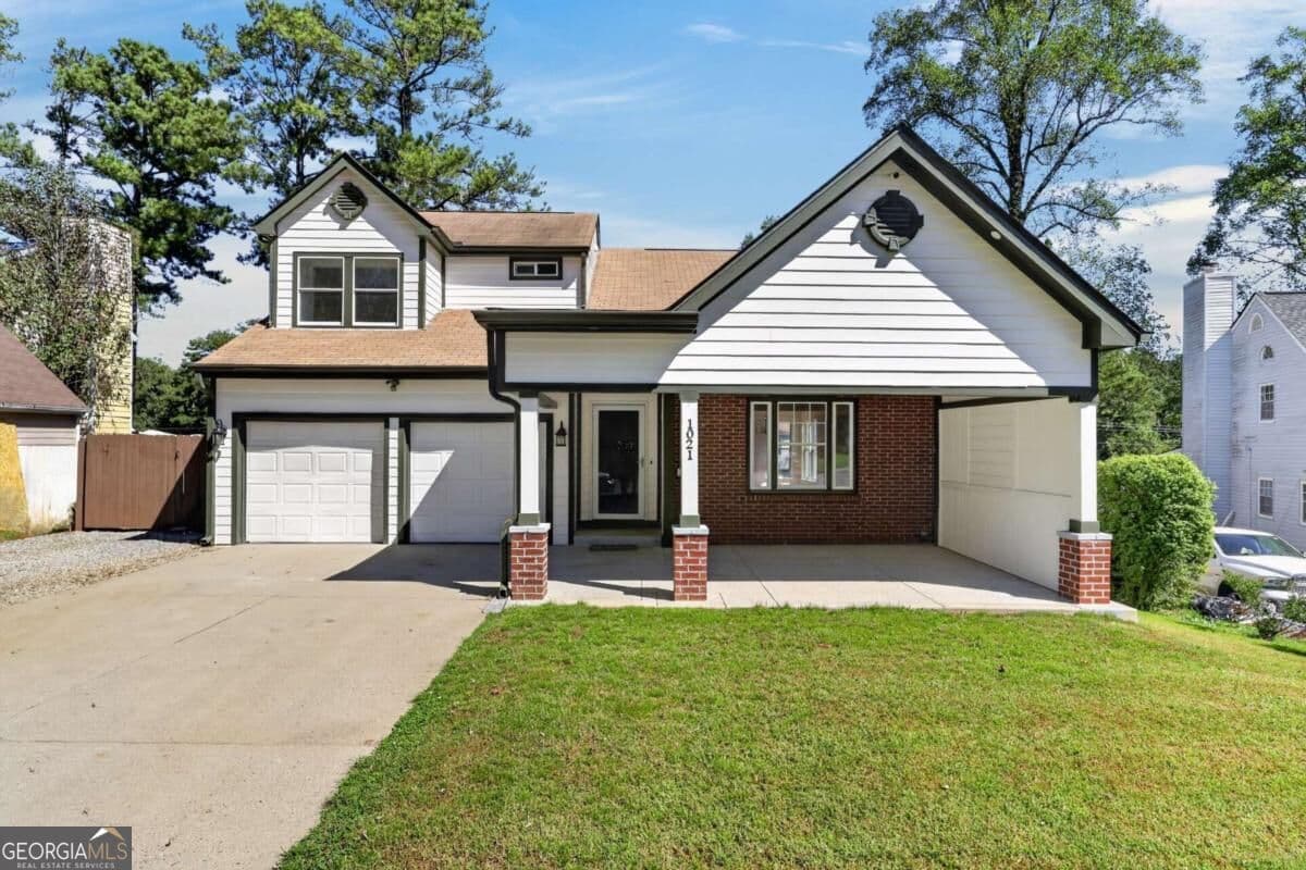 3 bedroom, 2.5 bathroom, 1,597 sq ft single family residence for sale at 1021 Heatherwood Court, Norcross, GA 30093 — photo 2