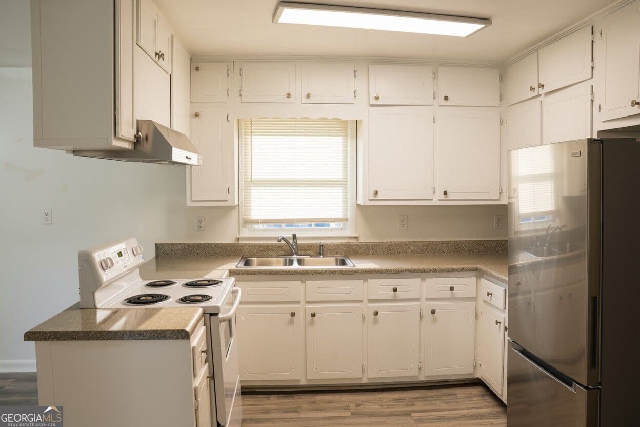 3 bedroom, 1.5 bathroom, 1,134 sq ft single family residence for sale at 884 Pine Roc Drive, Stone Mountain, GA 30083 — photo 7