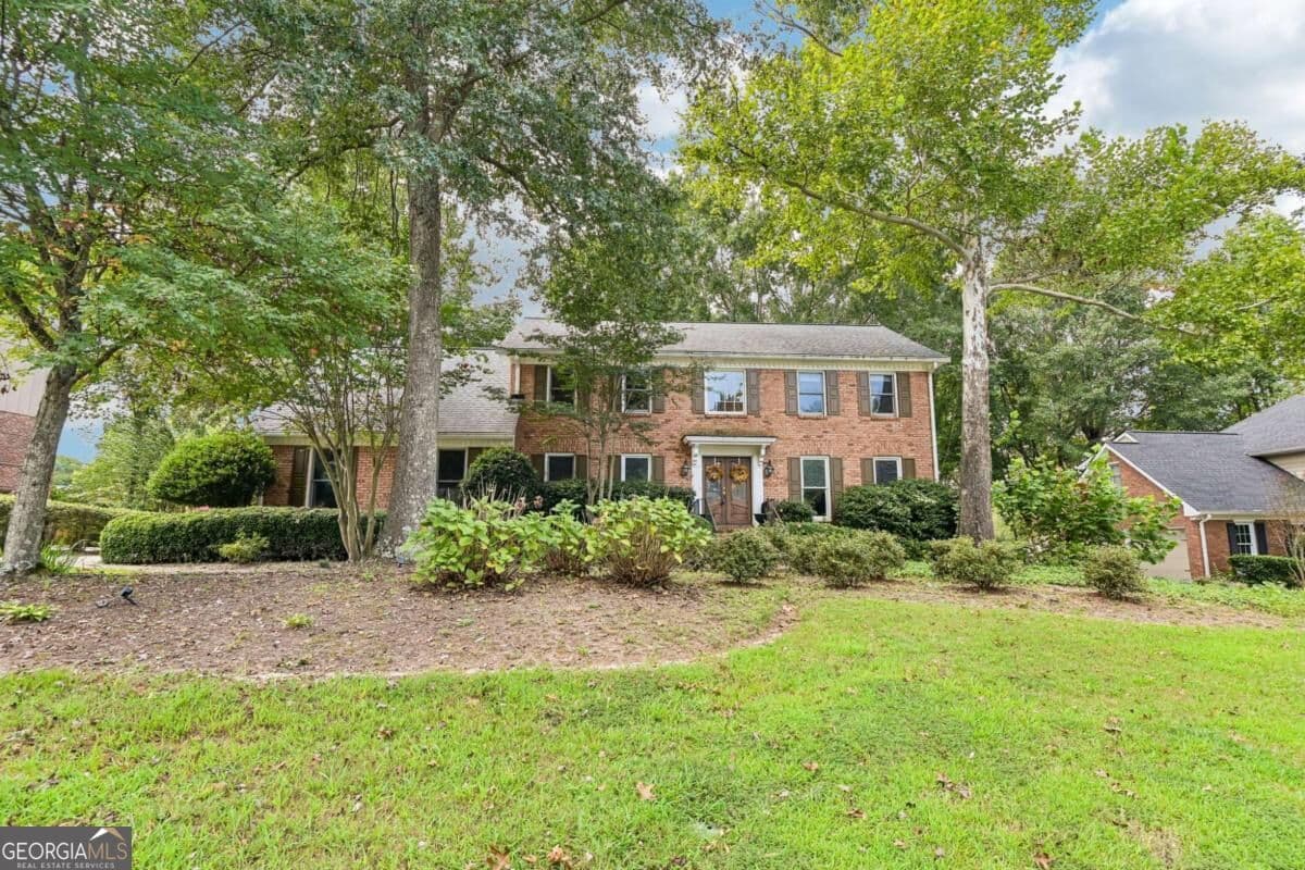 4 bedroom, 2.5 bathroom, 3,656 sq ft single family residence for sale at 3804 Club Forest Drive, Peachtree Corners, GA 30092 — photo 1 of 27