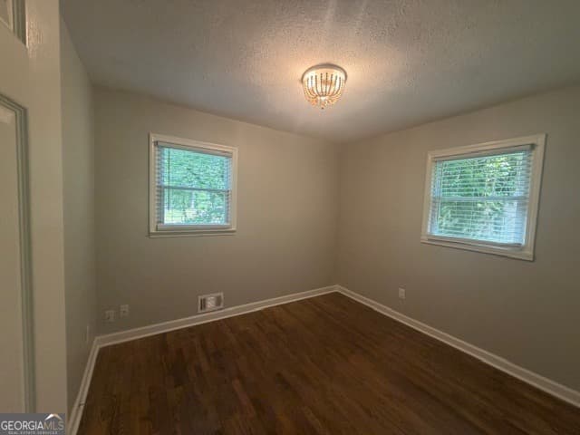 3 bedroom, 2 bathroom, 1,472 sq ft single family residence for sale at 6057 Blackhawk Trail, Mableton, GA 30126 — photo 4