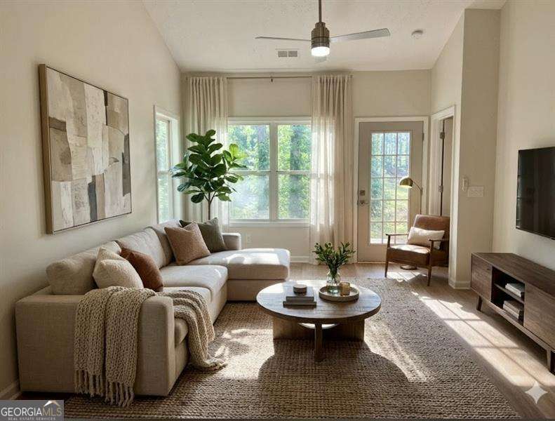 3 bedroom, 2.5 bathroom, 1,550 sq ft townhouse for sale at 2555 Flat Shoals Road 2701, Atlanta, GA 30349 — photo 3