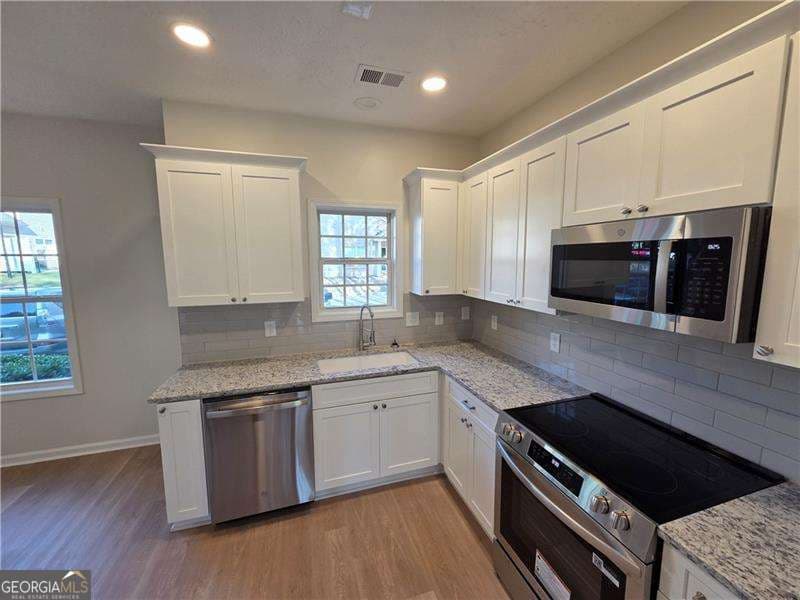 3 bedroom, 2.5 bathroom, 1,550 sq ft townhouse for sale at 2555 Flat Shoals Road 2701, Atlanta, GA 30349 — photo 8