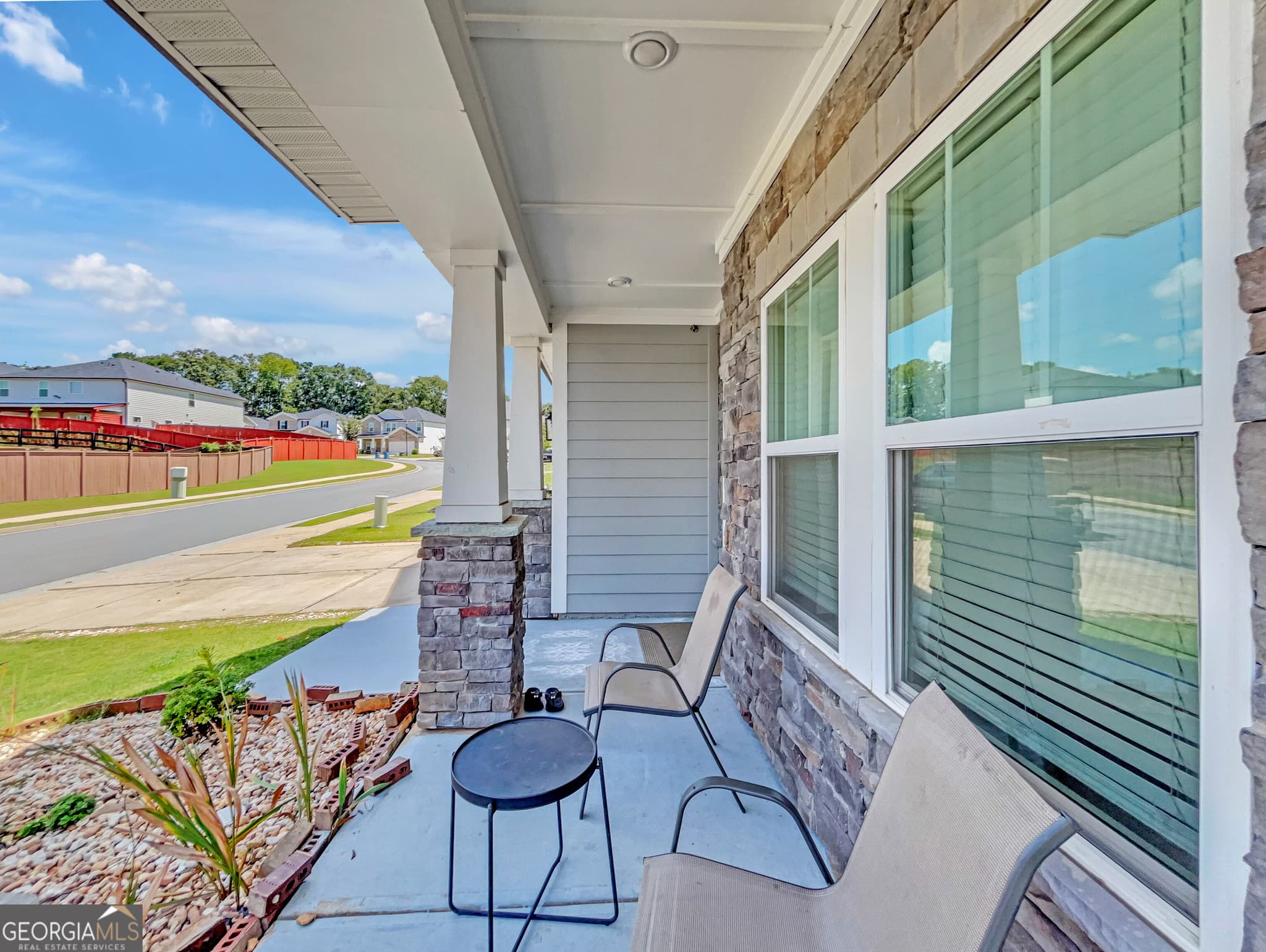 5 bedroom, 3 bathroom, 3,129 sq ft single family residence for sale at 5880 Hackberry Lane, Braselton, GA 30517 — photo 4